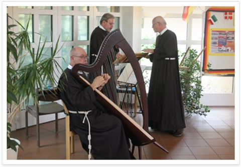 picture of Franciscan brothers playing music